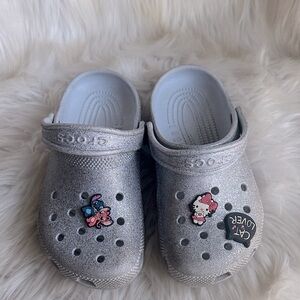 CROCS Kids' Silver Glitter Clogs with Pink and Blue Charms